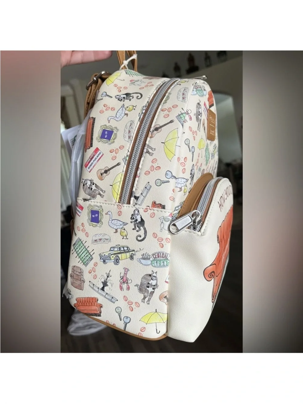 Loungefly Friends Cream and Orange Friends Backpack